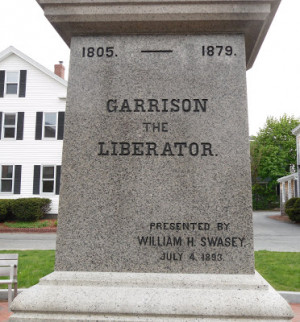 the imposing statue of william lloyd garrison stands in brown square