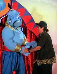 Robin Williams dances with the Disney character 'Genie' in Los Angeles ...