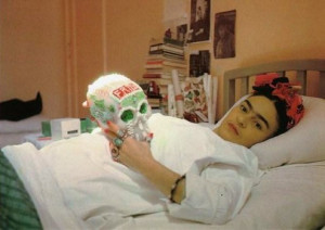 Frida Kahlo recuperating in bed with a sugar skull after another one ...