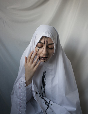 ... she has stained the name of the religion itself. An outsider may look