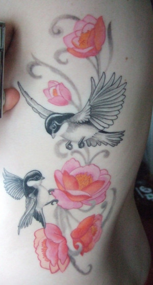 side-tattoos-for-girls-bird-and-flower