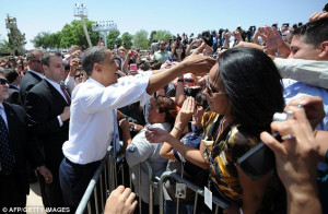 President Obama shakes hands with people after speaking on immigration ...