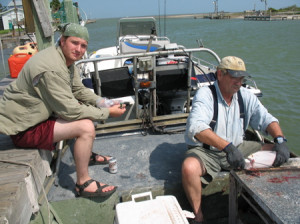 Myself and my father cleaning flounder off the coast of Texas