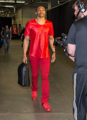 Why does Cam Newton dress like a professional businesswoman?