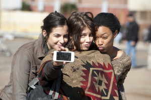 ... (Maggie), and Sonequa Martin-Green (Sasha) capturing a set selfie