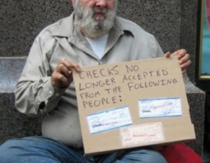 Homeless Guy Not Taking Checks…..