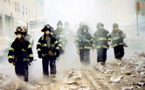 Firefighters working in the rubble after the collapse of the World ...