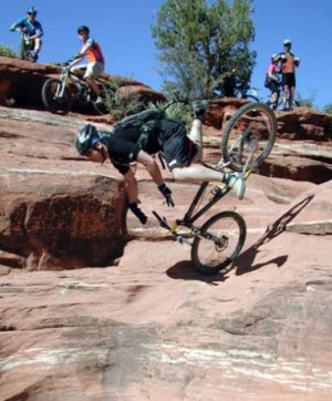 Bikes DON'T climb mountains, they ride on top of them.