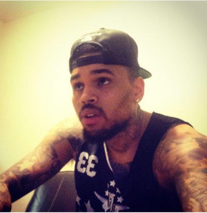 Chris Brown serving in new selfie