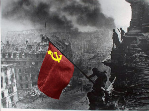 The famous image with the Soviet flag on the German Reichstag.