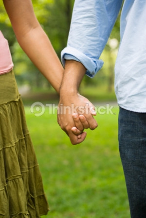 Young Couple Holding Hands
