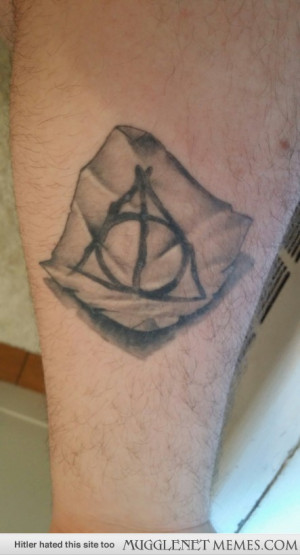 Deathly Hallows tattoo. Inspired by Xenophilius Lovegood!