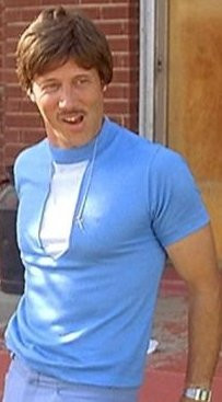 ... look more like Ron Bur­gundy or Uncle Rico from Napoleon Dynamite