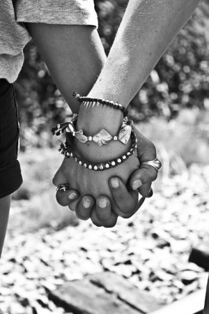 Friends holding hands