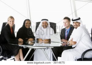 ... Eastern And Western Men / Women In Business Meeting Stock Photo