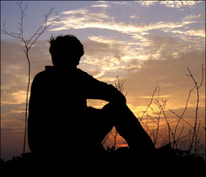 Person Sitting On Ground