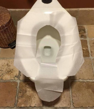 Ever wonder the best way to use a toilet seat cover?