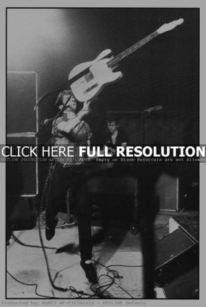 joe strummer, singer, old photos, black and white, guitar