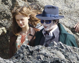 Love on the rocks: Johnny Depp strolls with his leading lady as he ...