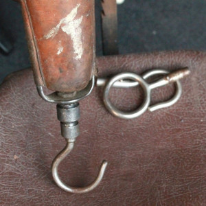 antique leather prosthetic arm