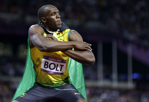 Jamaica's Usain Bolt celebrates winning the men's 200m final during ...