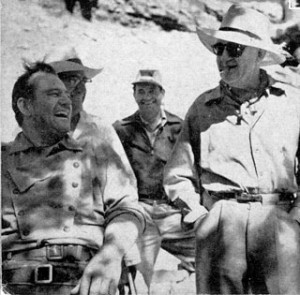 John Wayne and John Ford enjoy a laugh in Monument Valley while ...