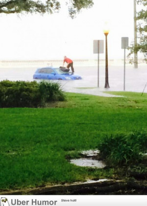 Pizza delivery guy stuck in a flooded road, but still saves the pizza ...
