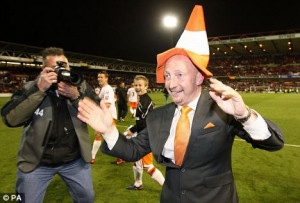 Mad as a hatter: Holloway celebrates reaching the Championship play ...