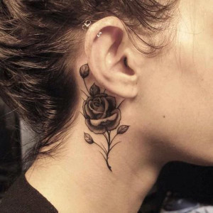 14 Small black and white rose tattoo on neck