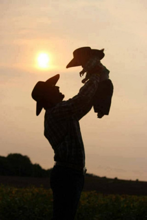 Sweet little cowboy w his dad