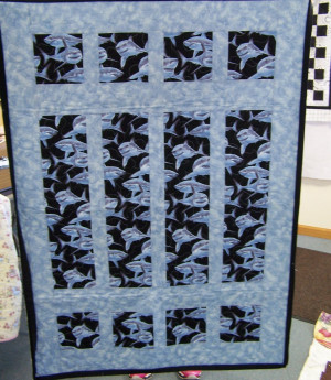 Shark Quilt. Nice pattern for a feature fabric.