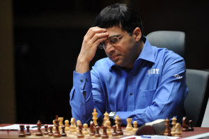 India's Vishwanathan Anand reacts during a FIDE World chess ...