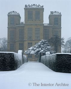 snow covered path leading to Hardwick Hall The initials 39 ES 39 on ...