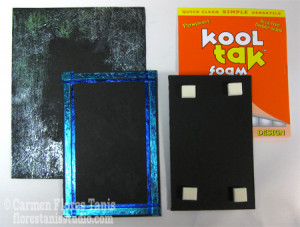 Put four Kool Tak™ 3D Foam Pads on the back of the small ...