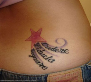 shooting star with Italic Tattoo at the right side of girl's lower ...