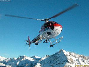helicopter-flying-on-the-white-snow-mountains-HD-Wallpapers-1024-x-768