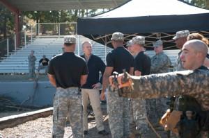 Under Secretary of the Army Brad Carson speaks with the cadre who