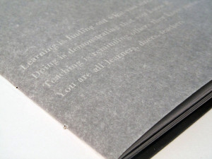 the white text on tracing paper can only be seen on the black side of ...