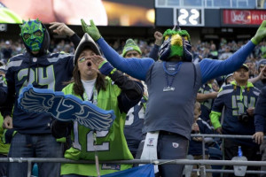 Spirited Seattle Seahawks fans cheer on the players during their game ...