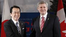 Minister Stephen Harper, right, and Japanese Prime Minister Naoto Kan ...
