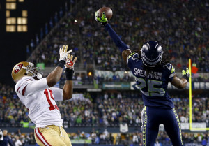 Seahawks cornerback Richard Sherman tips a pass in the end zone ...