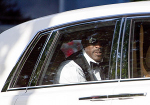 Michael Jordan heads to his reception in a white Rolls Royce.