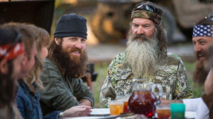 by A&E shows Phil Robertson, flanked by his sons Jase Robertson ...