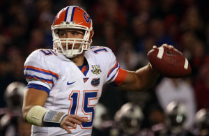 Tim Tebow 15 of the Florida Gators drops back to pass against the ...