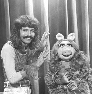 Magician Doug Henning with his chipmunk grin and dangling hair was a ...