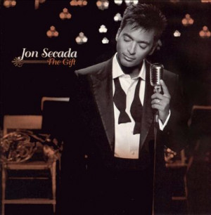 Jon Secada Sings About His...