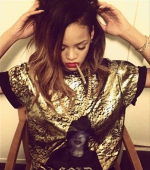 rihanna via instagram rihanna poses with what appears to be a hand ...