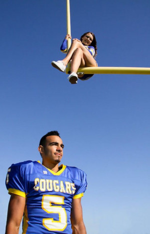 Football player and cheerleader