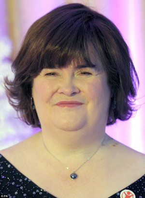 Susan Boyle models controversial feathered headdress at T In The Park ...