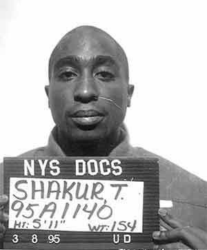 Tupac in a police mugshot (March 8, 1995